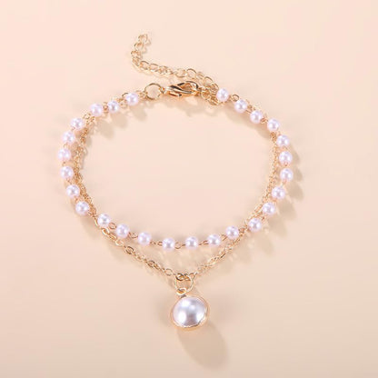 LustreLoom Pearl Bracelet – Double-Layer Elegance in Gold
